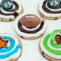 Decorated Cookies · Chocolate Chip Cookie Cake with varied decoration.