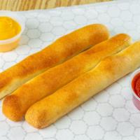 Bread Sticks (3) · Comes with one dipping sauce.