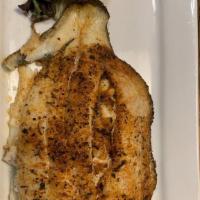 Stuffed Flounder · Stuffed with lump crab imperial, fish rubbed, spiced and baked.