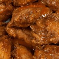 Anna'S Wings · Breaded wings tossed in your choice of one of our signature sauces: Buffalo, BBQ, or Carolin...