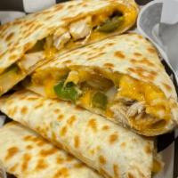 Chicken Quesadilla · Filled with chicken, Cheddar cheese, green peppers and onions. Served with sour cream and sa...