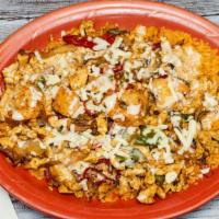 Ranchero Special · Cooked chicken and shrimp served on a bed of rice and covered with sautéed bell peppers, oni...