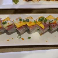 Fantastic Roll · shrimp tempura , snow crab ,avocado . topped w / seared tuna mango  scallion roe  serve wasa...