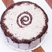 Oreo Cake · Our moist two layered chocolate cake that is covered with our Homemade Oreo Infused Buttercr...