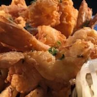 Shrimp Dinner · Our large jumbo shrimp lightly breaded and flash fried and served with a side of hand cut fr...