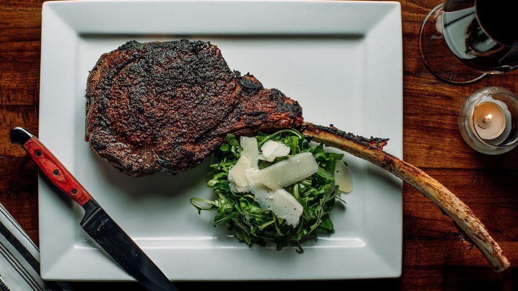 Tomahawk Bone-In Ribeye (32Oz) · All steaks are certified Angus beef and are cooked at 1800oF for a charred exterior finish.