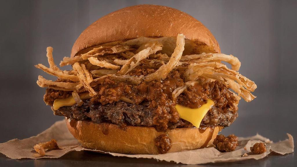 The Sloppy Whoa · Quarter pound of fresh, never-frozen Certified Angus Beef®, American Cheese, Chili, Fried Onion Strings, hint of A.1.® Sauce, Potato Bun