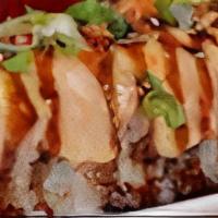 Yummy Roll · Inside: tempura shrimp, avocado
topping: fried red snapper, snow crab 
sauce : eel and spicy...