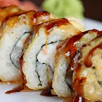 Gold Point Roll ( Tempura Fried ) · Inside: salmon, snow crab, avocado, masago 
sauce : ell.