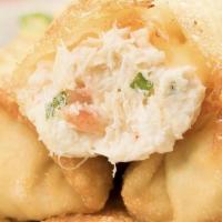 Snow Crab Egg Rolls · Deep fried snow crab egg rolls served with sweet chili sauce.
