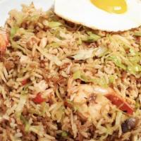 Javanese Fried Rice · Spicy. Sweet and spicy with shrimp, chicken, steak, bean sprout, onions, carrots fried egg.