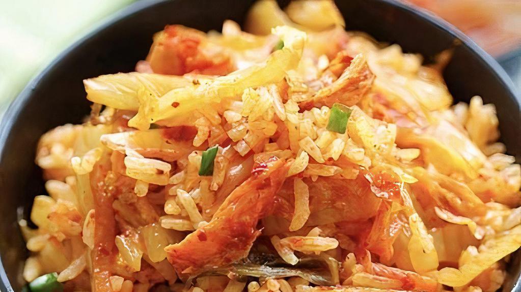 Kimchi’S Fried Rice · Kimchi vegetables, shrimp, carrots, onion.