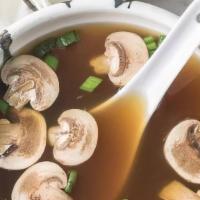 Clear Soup · Clear beef broth, mushrooms ,green onion, and fried onion.