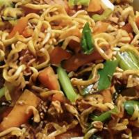 Mie Tek Tek · Javanese stir fried noodle, egg , shrimp, bok choy , bean sprout, carrots, onion 
sweet spic...