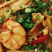 Singapore Noodles · Rice noodle, curry flavor, shrimp, onion , bok choy , bean sprout and egg , carrots.