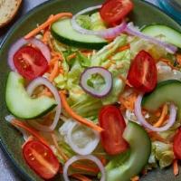 Side Garden Salad · Lettuce blend, cucumbers, tomatoes, carrots, red onions, choice of dressing served on the si...