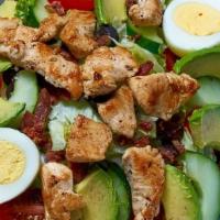 Cobb Salad · Lettuce blend, cucumbers, cherry tomatoes, black olives, avocado, hard boiled egg, bacon ser...