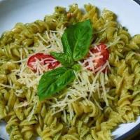 Basil Pesto Pasta · Homemade basil pesto*, pine nuts*, cherry tomatoes. *Contains tree nuts