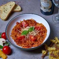 Bolognese Pasta · Homemade tomato meat sauce, onions, carrots, cherry tomatoes, garlic, basil