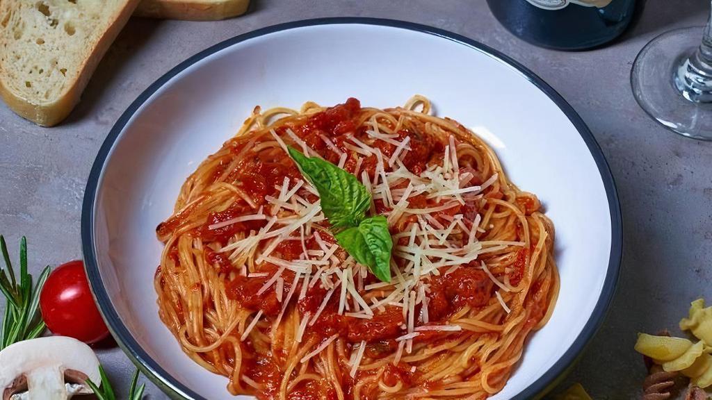 Marinara Pasta · Homemade tomato sauce, garlic, basil