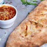 Meat Lovers Calzone · Stuffed pizza with homemade tomato sauce, pepperoni, ham, Italian sausage, and mozzarella