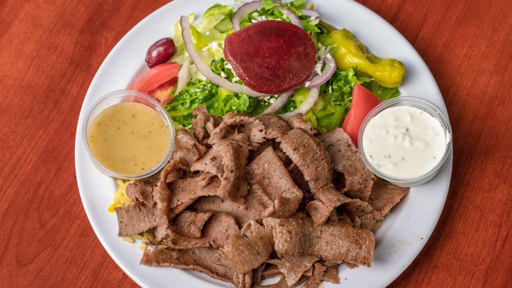 Gyro Meal · Freshly sliced gyro meat over rice.