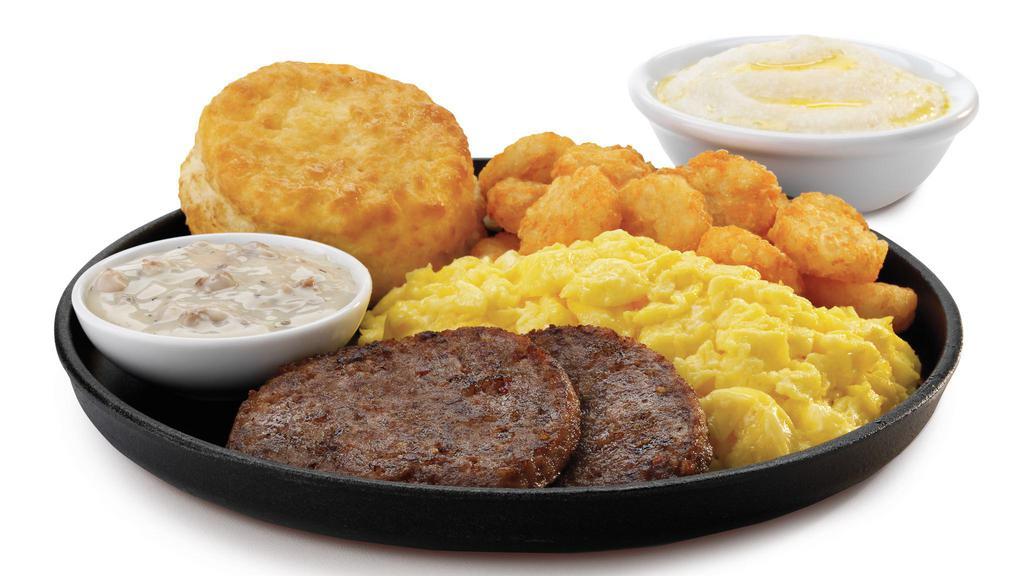 Breakfast Deluxe · Two scrambled eggs, home-style hearty grits, white sausage gravy, hash browns, and a  made-from-scratch buttermilk biscuit. Served with your choice of  meat.