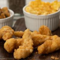 Chicken Tenders Basket Meal · A timeless favorite, our juicy chicken tenders are fried to golden-brown goodness. Served wi...