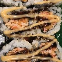 Spicy Salmon Roll · These items contain raw ingredients, consuming raw or undercooked meats, seafood, or eggs ma...