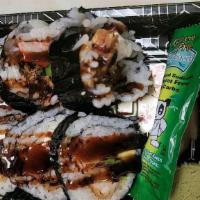 Rock N Roll · Crabmeat, tempura shrimp, avocado and cream cheese.