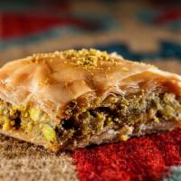 Walnut Baklava · Traditional diamond-shaped sweet pastry made with filo dough and walnuts.
