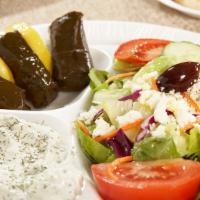 Greek Veggie · Fresh Greek salad, stuffed grape leaves, cucumber sauce and grilled Grecian pita.