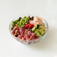 Tuna Bowl · Two scoops of tuna over a bed of white rice and spring mix. Mixed with baby cucumbers, sweet...