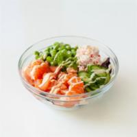 Salmon Bowl · Two scoops of salmon over a bed of white rice and spring mix. Mixed with baby cucumbers, swe...
