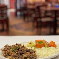 Shawarma Platter · Shawerma sauteed in sauce with rice and vegetables.