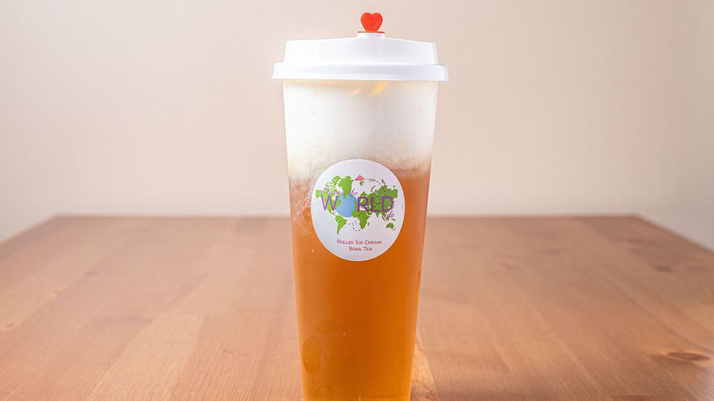Oolong Golden Flower Milk Tea · Grown in the misty mountains of Anxi County in Fujian, China it is a rolled leaf style, low oxidation oolong that offers sweet, floral notes of honeysuckle, osmanthus and a subtle creaminess. Contains a moderate level of caffeine.