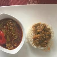 Suppa Kandja · Lamb and fish stew with okra cooked with palm oil served over white rice
