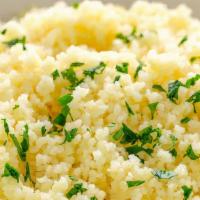 Couscous · Couscous is a North African dish of small steamed granules of rolled durum wheat semolina th...
