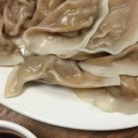 Peking Steamed Dumpling · Eight pieces.