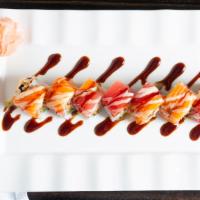 Sexiest Man Roll · Spicy tuna, spicy snow crab, avocado topped with tuna, salmon, and chef's special sauce.