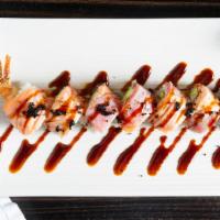 Black And Gold Roll · Shrimp tempura, avocado, crunch topped with seared tuna, salmon, tobiko served with chef's s...