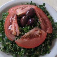 Tabbouleh Quinoa · Fresh green herbs tossed with bulgar, lemon, and extra virgin olive oil.