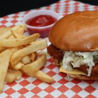 Fish Burger · Fried fish, tartar sauce, lettuce, and American cheese. Served with fries.