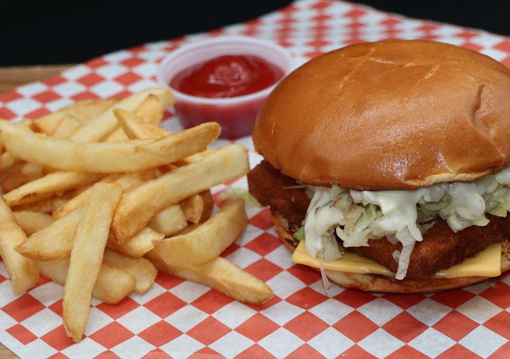 Fish Burger · Fried fish, tartar sauce, lettuce, and American cheese. Served with fries.