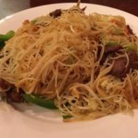 Singapore Rice Noodles · thin rice noodles sauteed with eggs,onions,cabbage and sprouts in lite spicy curry sauce.