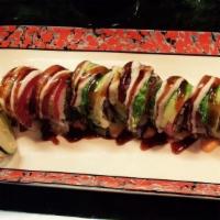 Surf And Turf · shrimp tempura and avocado topped with seared tuna, steak and chef's sauce