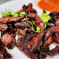Thai Beef Jerky · Fried marinated Thai style beef jerky served with Thai sweet chili sauce.