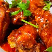 Rice & Spice Wing · spice   .Deep-fried marinated chicken wings tossed in special house chili garlic sauce.