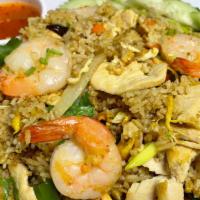 Pineapple Fried Rice · peanut.Jasmine rice with chicken and shrimp, egg, pineapple, cashew nuts, raisins, curry pow...