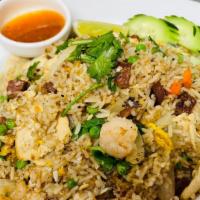 Vietnamese Fried Rice · Jasmine rice with a combination of shrimps, chicken, Chinese pork sausages, egg and mixed ve...